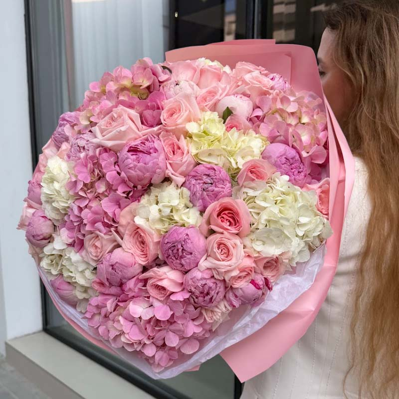 Bouquet of pink and white hydrangeas, pink roses and pink peonies Flora Harmony